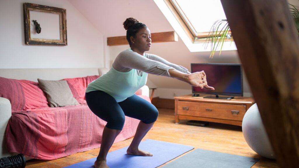 woman doing a squat